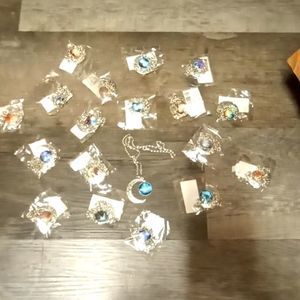 Galaxy moon necklace available in bulk!